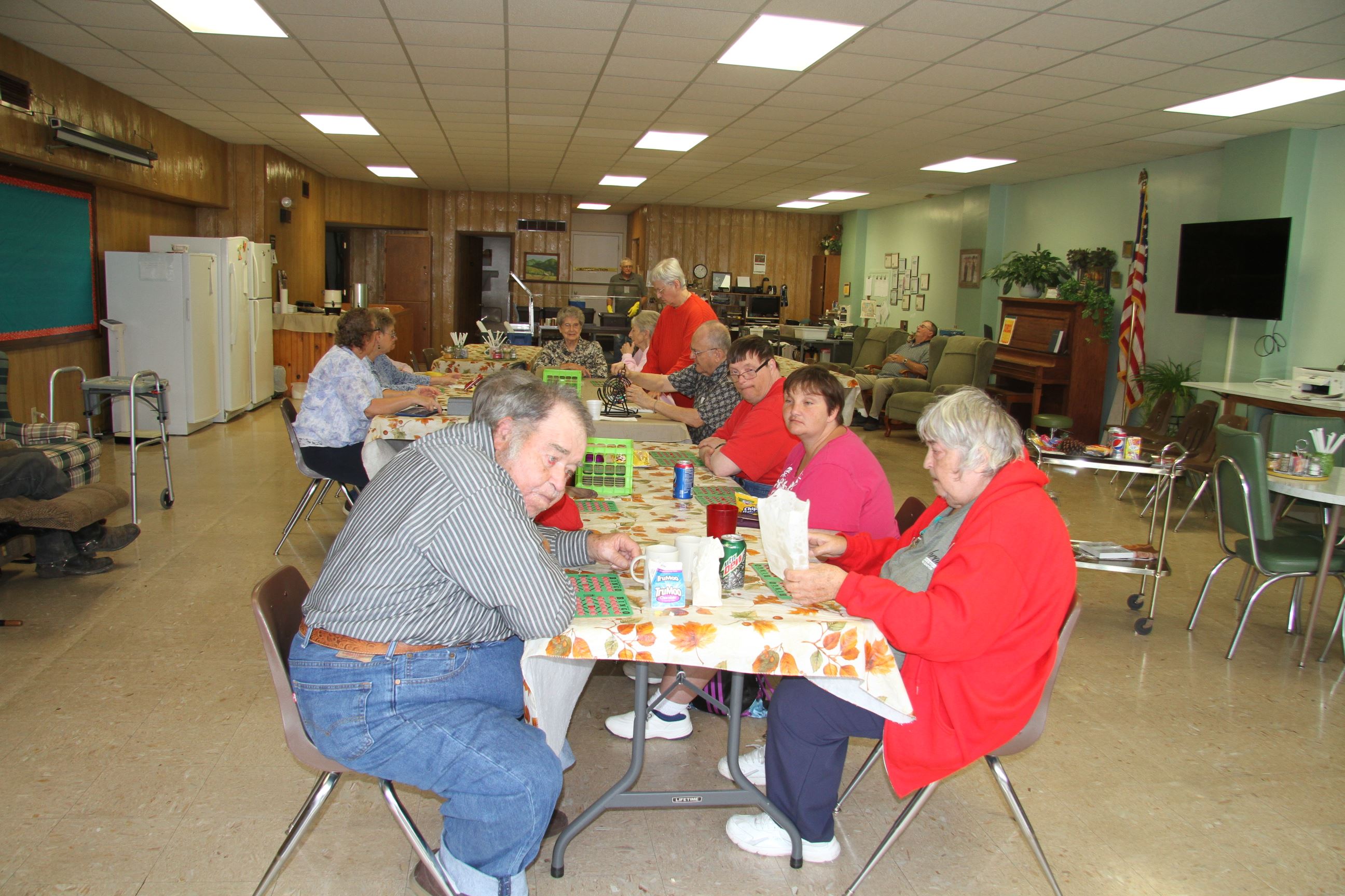 People Sitting at Tables Playing Bingo
