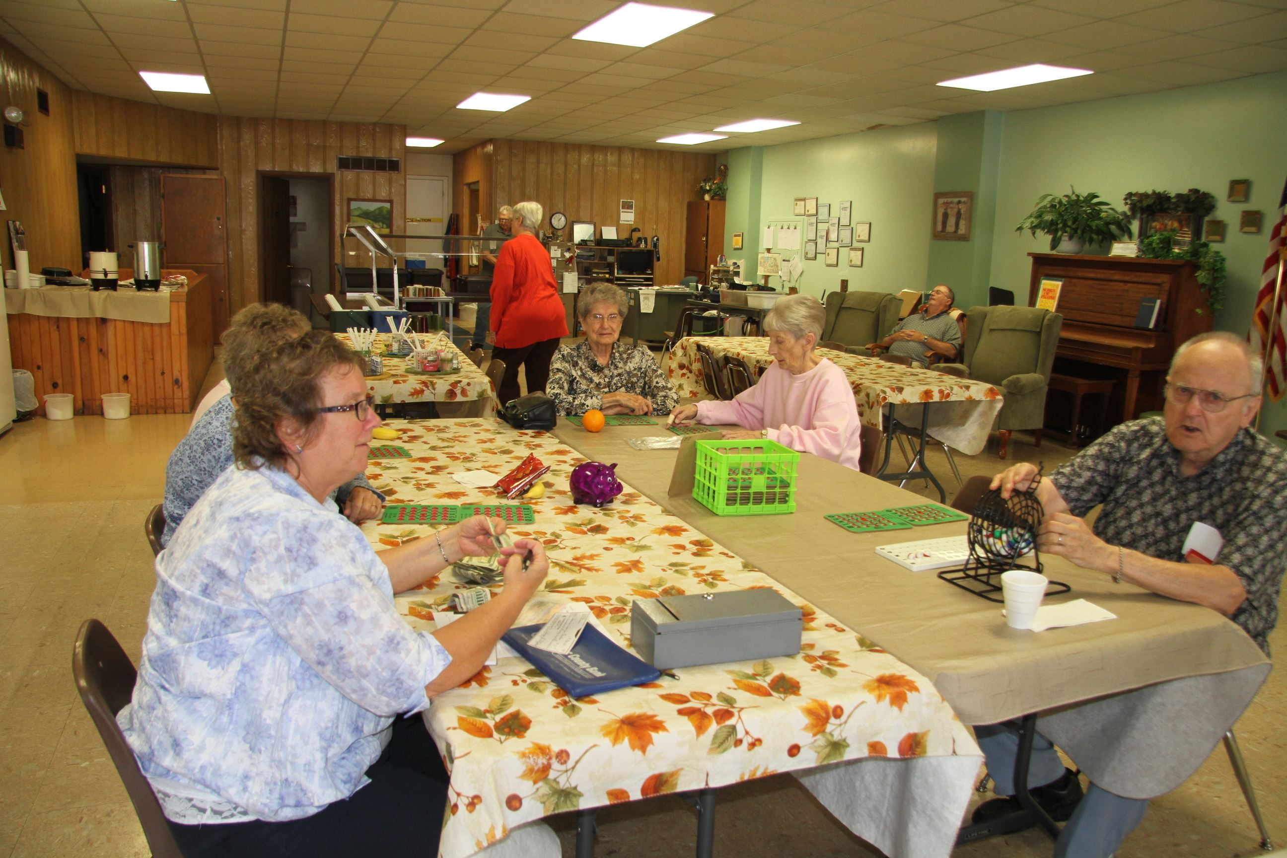People Sitting at Tables Playing Bingo