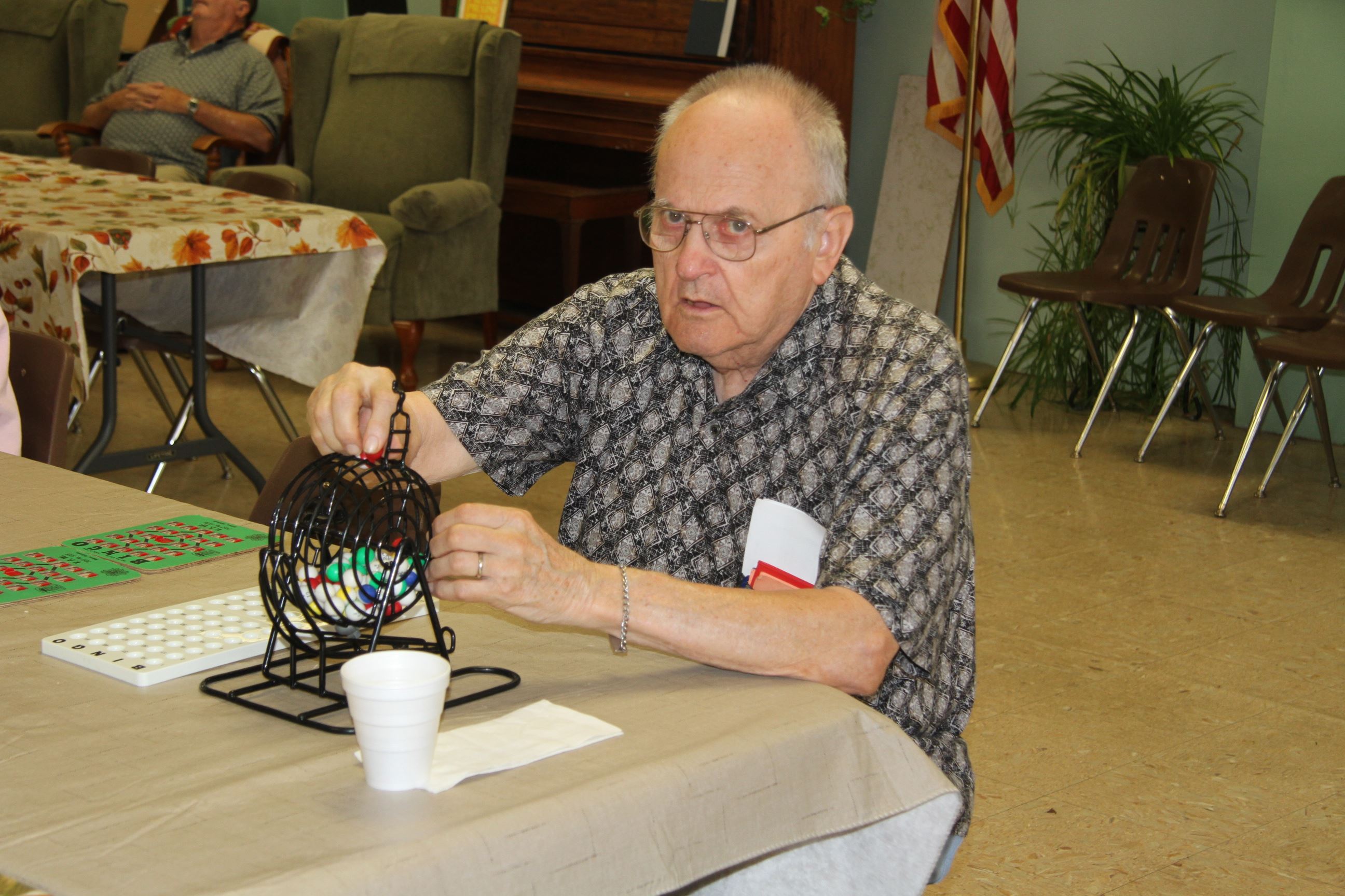 Man Calling Numbers for Bingo